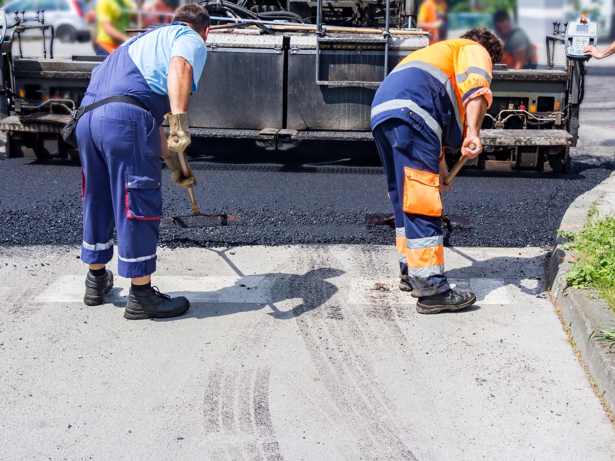 GMCS team performing road maintenance work
